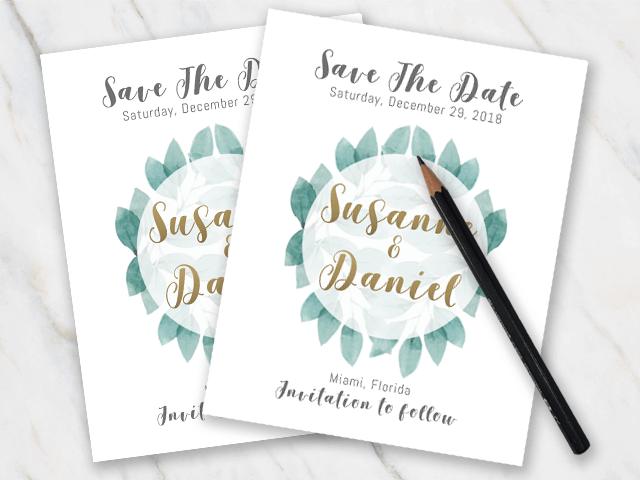 Example of wedding save-the-date with green leaves and golden font